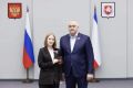 Торжественная церемония вручения первых паспортов гражданам Российской Федерации в честь Дня России