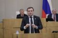 Представил на пленарном заседании Государственной Думы отчёт о работе Комитета по строительству и жилищно-коммунальному хозяйству за VIII созыв